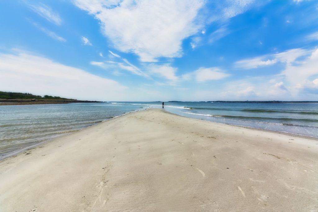 Play in gentle water or sunbathe on the white sand at Goose Rocks Beach.