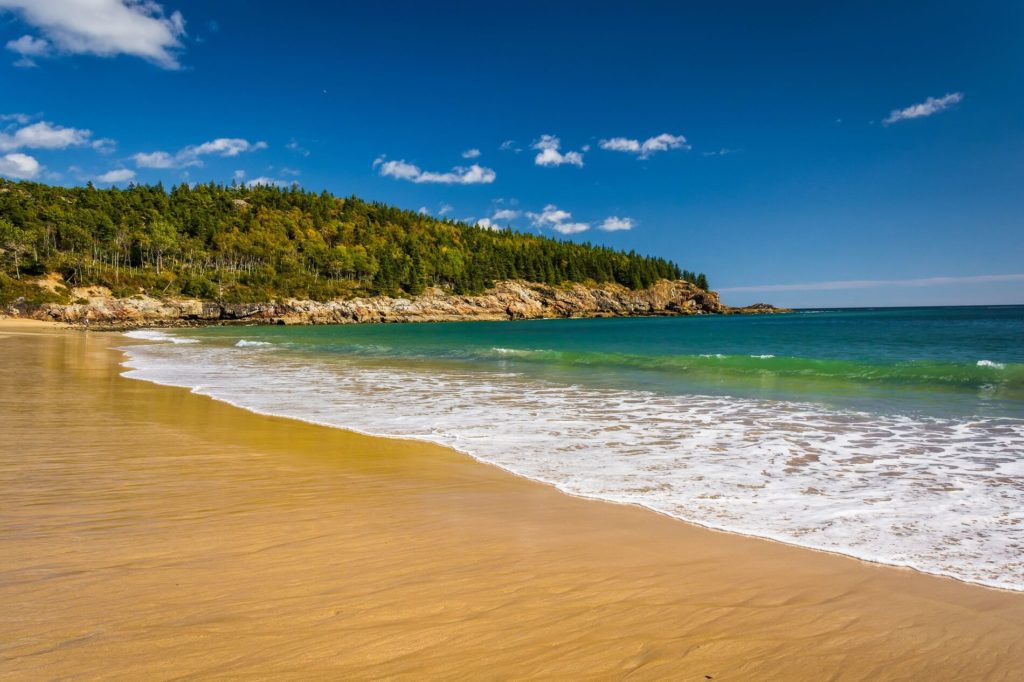 Sand Beach offers spectacular scenery and is located in the iconic Acadia National Park.