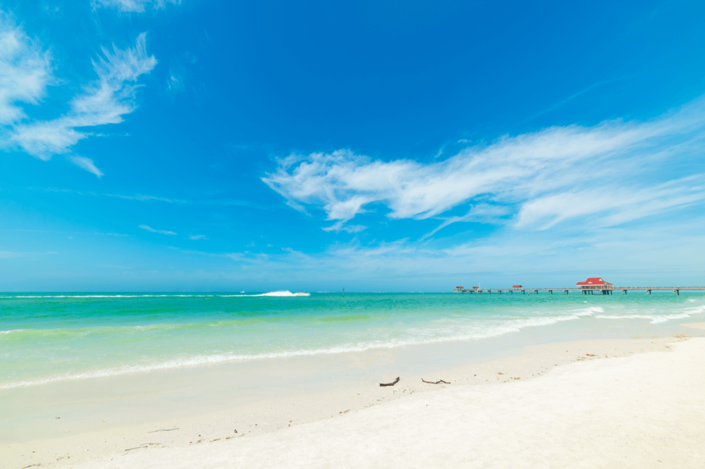 Clearwater Beach’s sugar-white sand, emerald water, and laid-back vibe offer a peaceful getaway. 