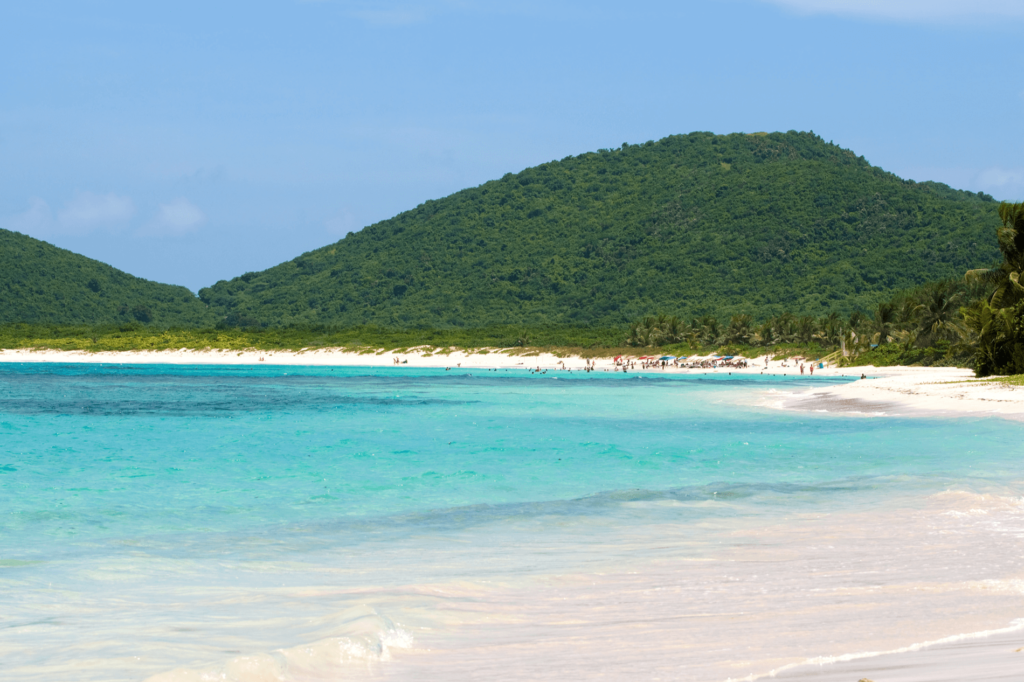 Flamenco Beach is known for shallow turquoise waters and white sands.