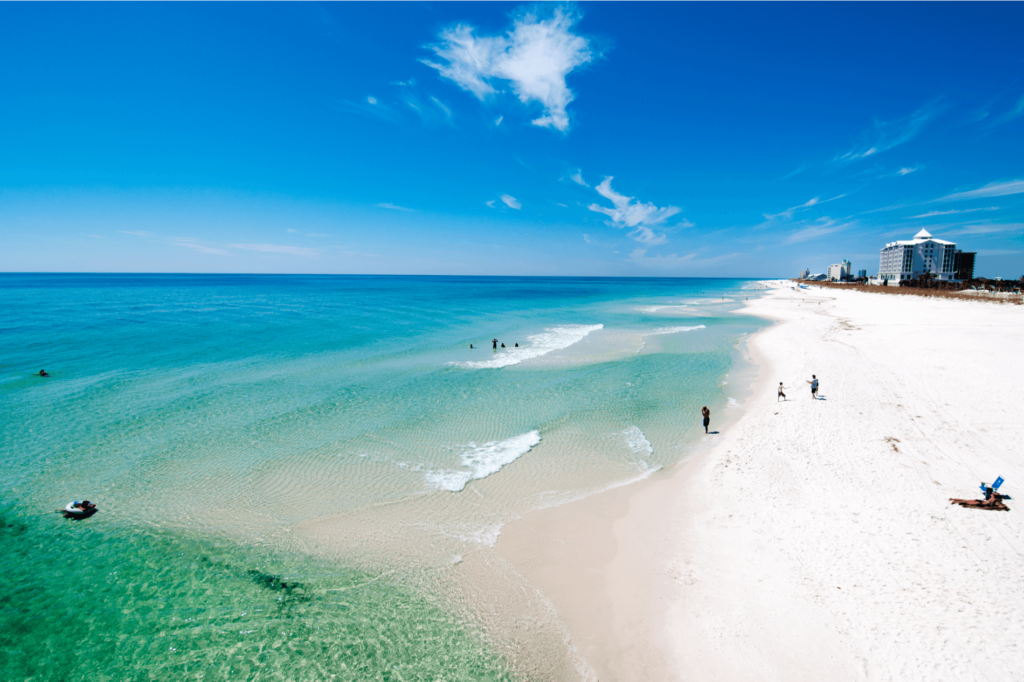 Pensacola Beach is well-known for its pearl-colored sand, sea green water, and ample sunshine.  