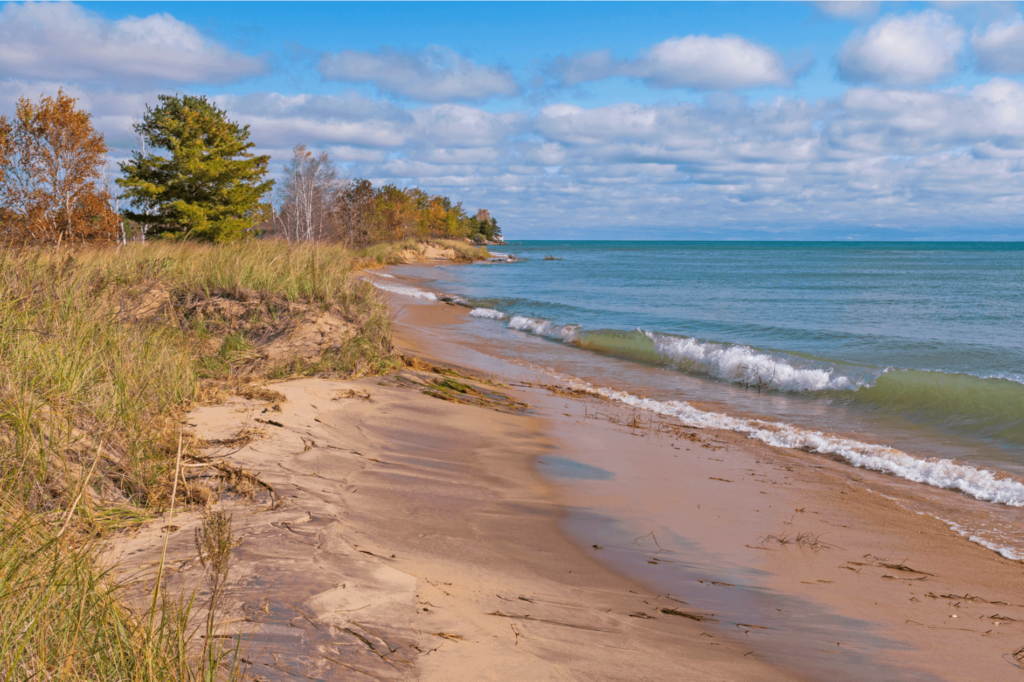 Tawas Point State Park Beach is one of the most iconic Michigan beaches on Lake Huron, offering excellent swimming opportunities.