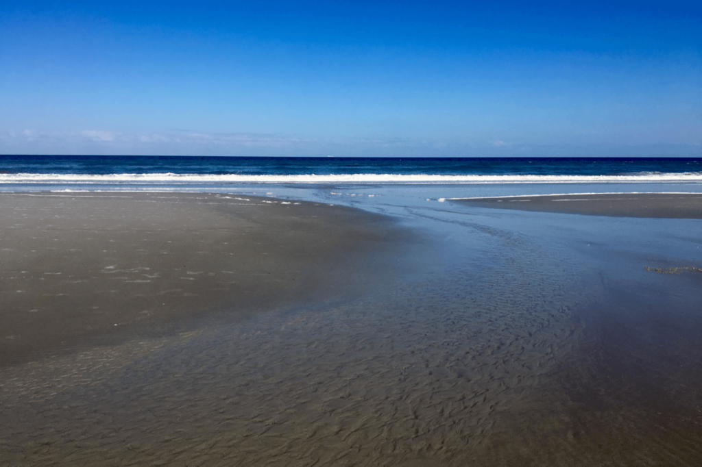 Neptune Beach is an excellent spot for swimming, sunbathing, and fishing.