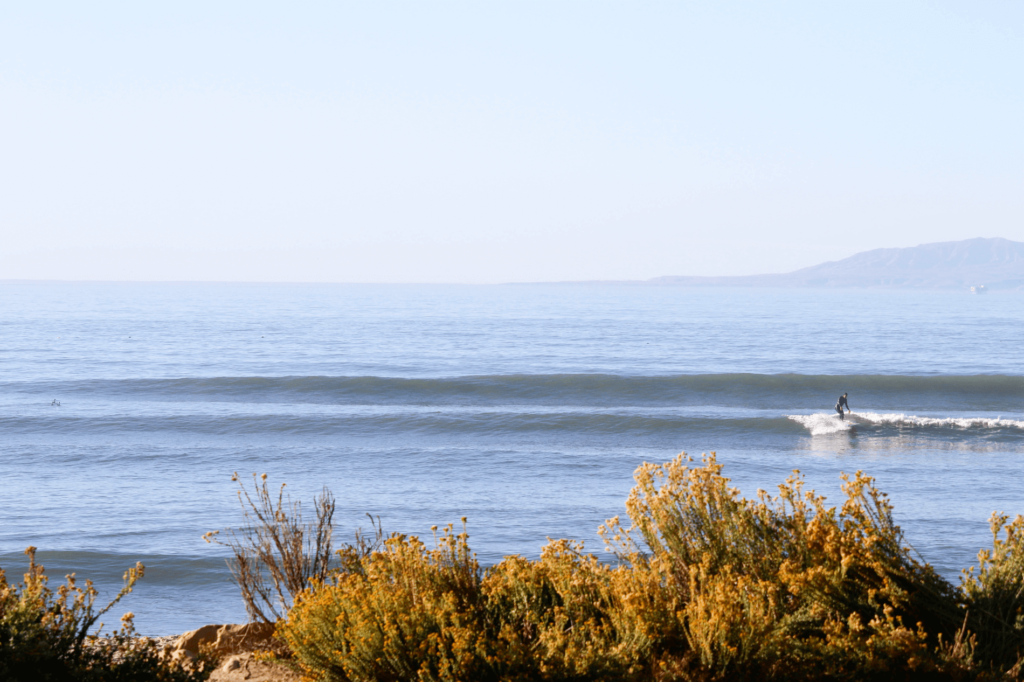 Mondos Beach is perfect for beginner surfers, swimmers, and paddleboarders.