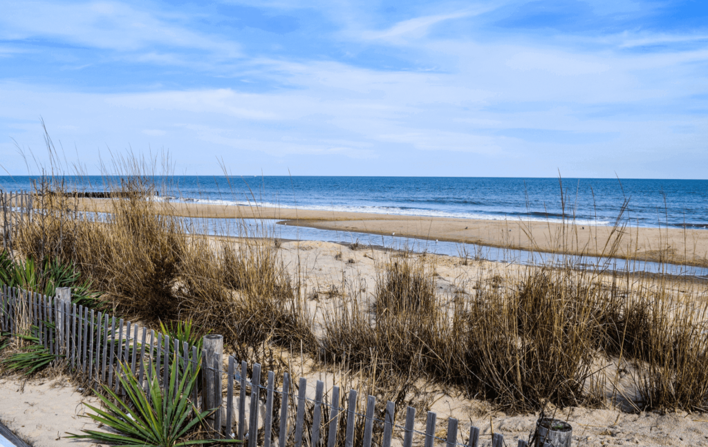 Rehoboth Beach is a popular destination for families with a lively boardwalk, calm waves, and local shops.